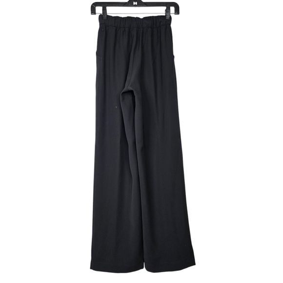 Lululemon Noir Wideleg pants with tie on the waist - Picture 5 of 11